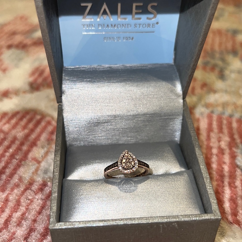 Zales gold and diamond promise ring; pear shape, women’s size 6.5.